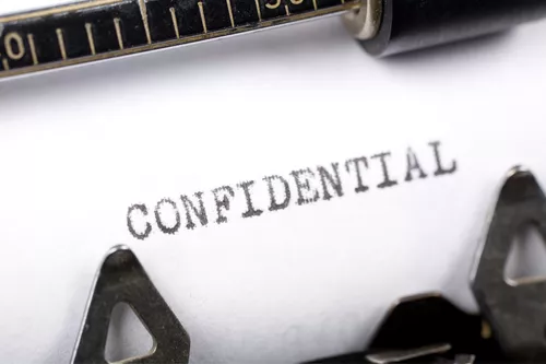 Typewriter with "Confidential Waste" typed | Confidential Waste Disposal 