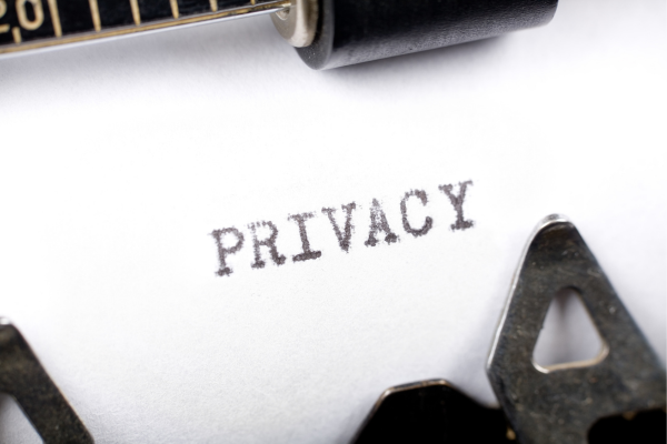 Tpe writer has typed the word privacy onto a piece of paper | GDPR Confidential Waste