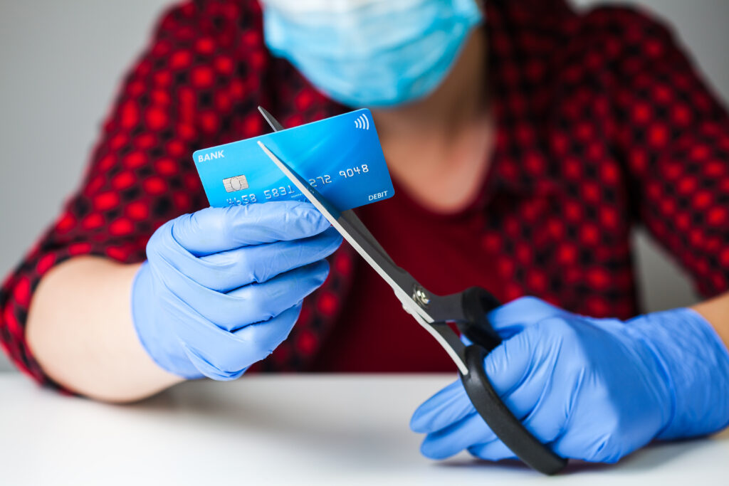 IMAGE SHOWING A BANK CARD BEING CUT UP - HOW TO PROTECT YOUR DATA STEP 2